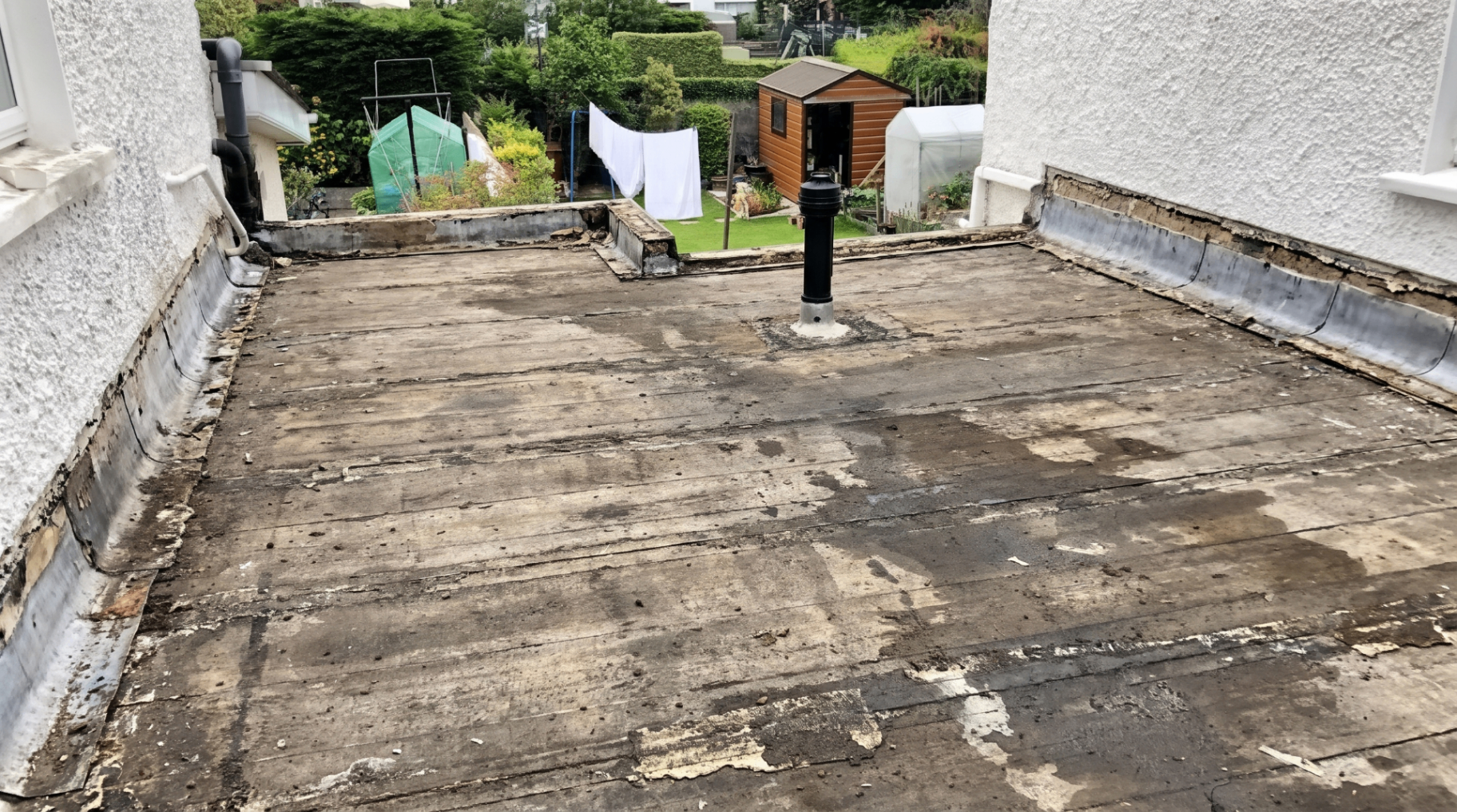 Before — Stripped back, rotten old felt roof