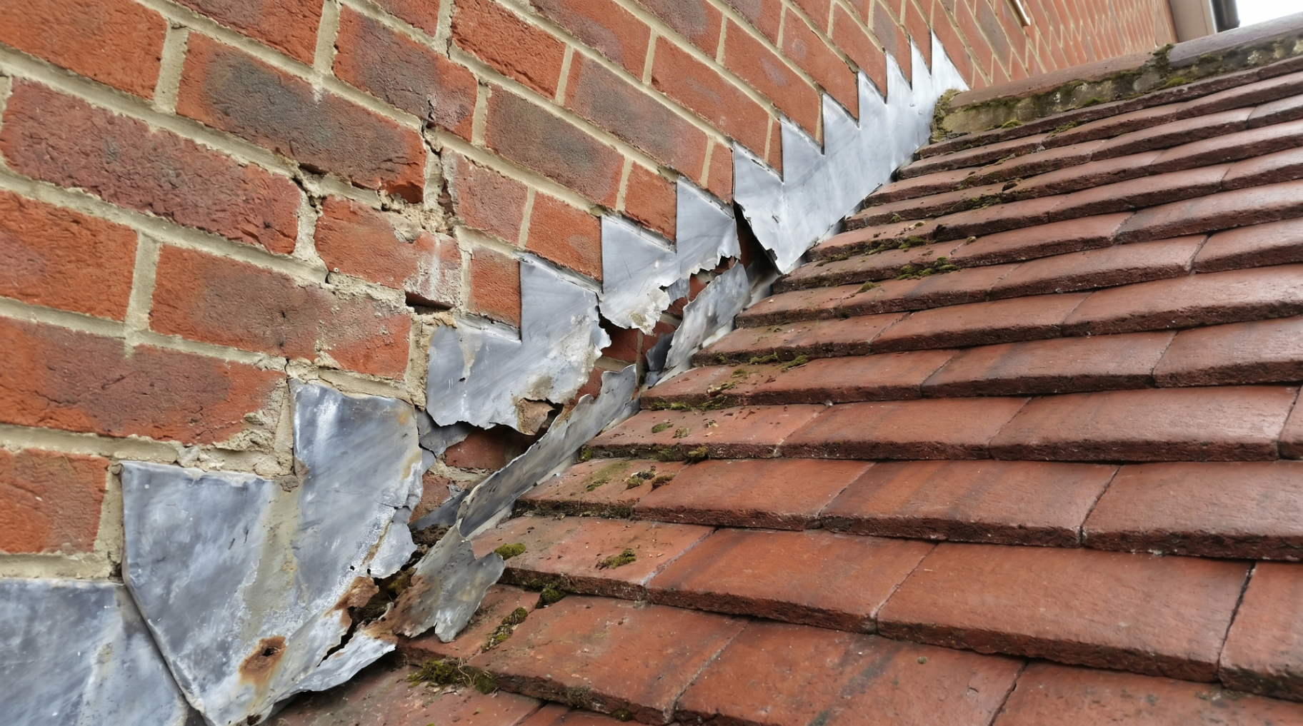 Before — Cracked, lifting lead